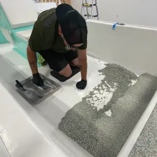 Works Starts on installing rubber decking on boat